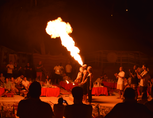 Fire Dancer in Desert Camp